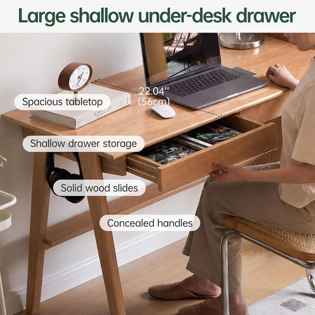 Open shallow drawer showing solid wood slides and concealed handle