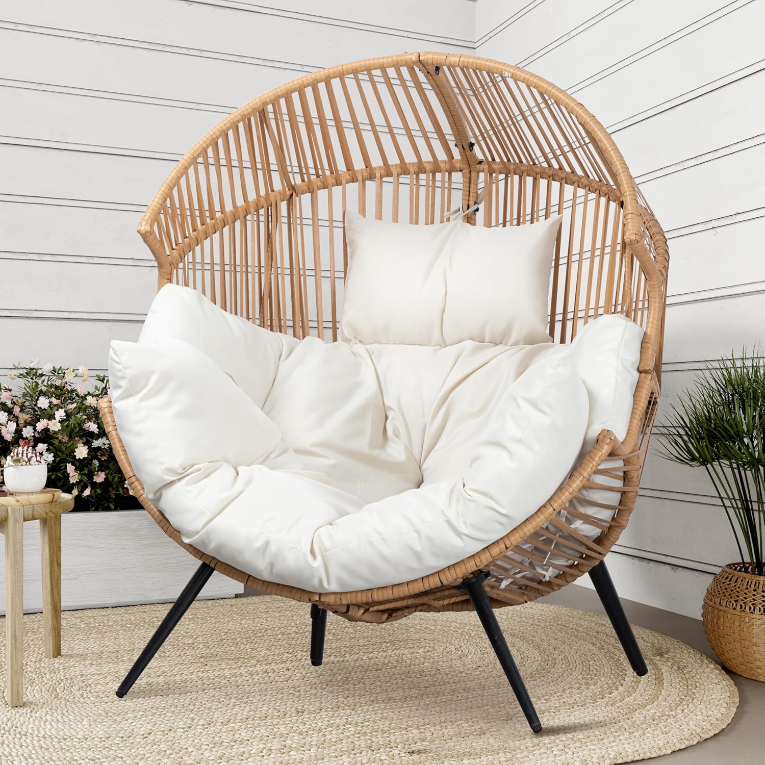 Shintenchi wicker egg chair with cream cushion
